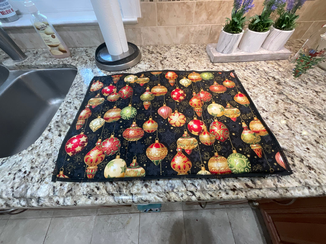 Antique Ornaments on Black Dish Drying Mats