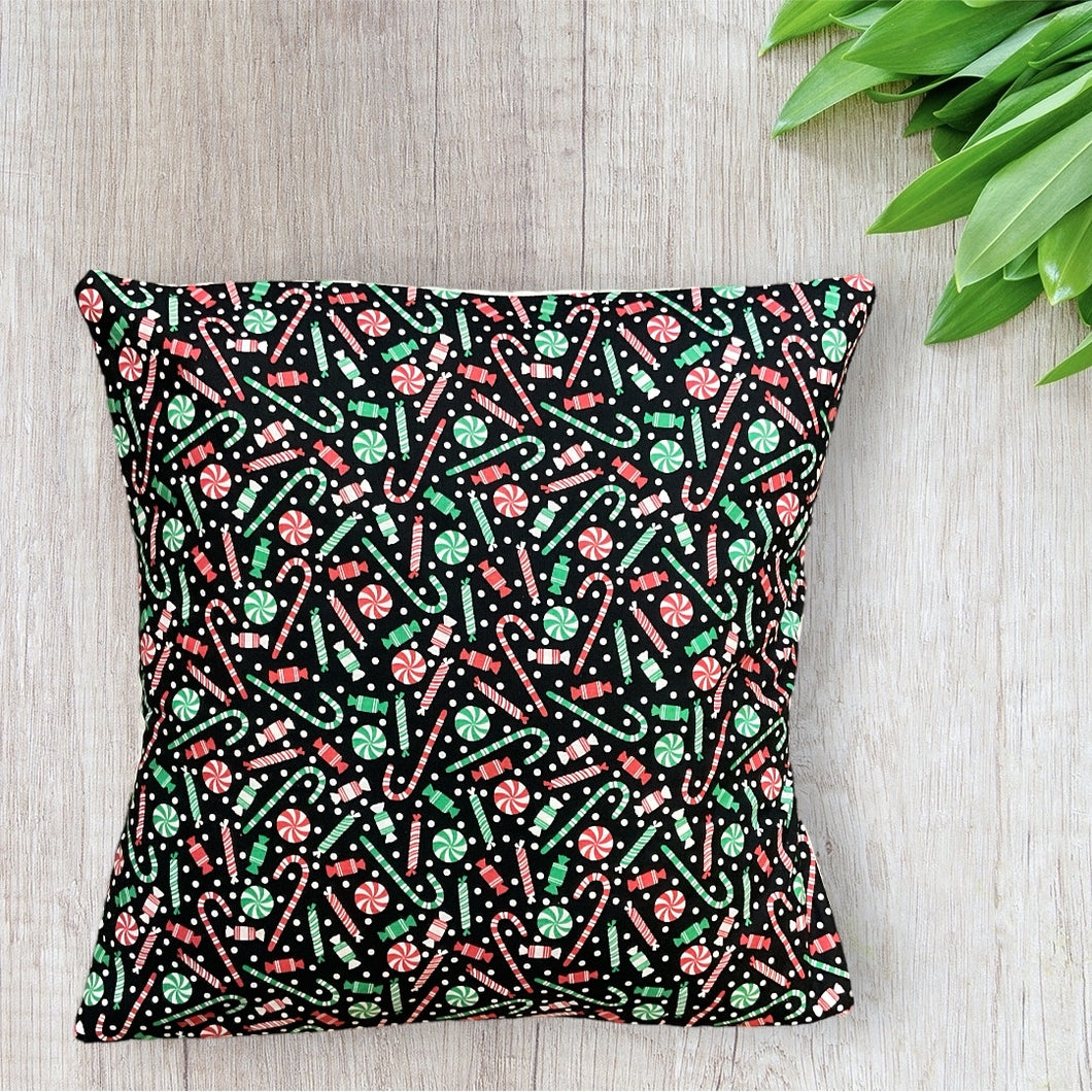 Christmas Candy on Black Pillow Cover