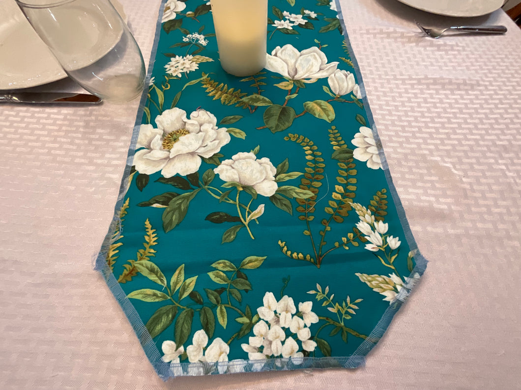White Flowers On Teal Table Runners